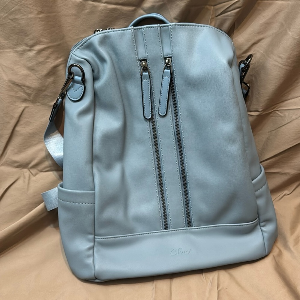 Cluci Blue vegan leather backpack purse


Gently used. Lots of pockets!